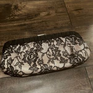 Lace clutch with strap
